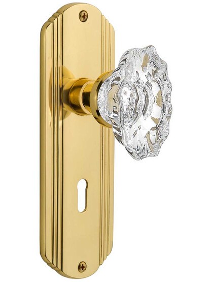 Streamline Deco Door Set with Keyhole and Chateau Crystal Glass Knobs in Un-Lacquered Brass.